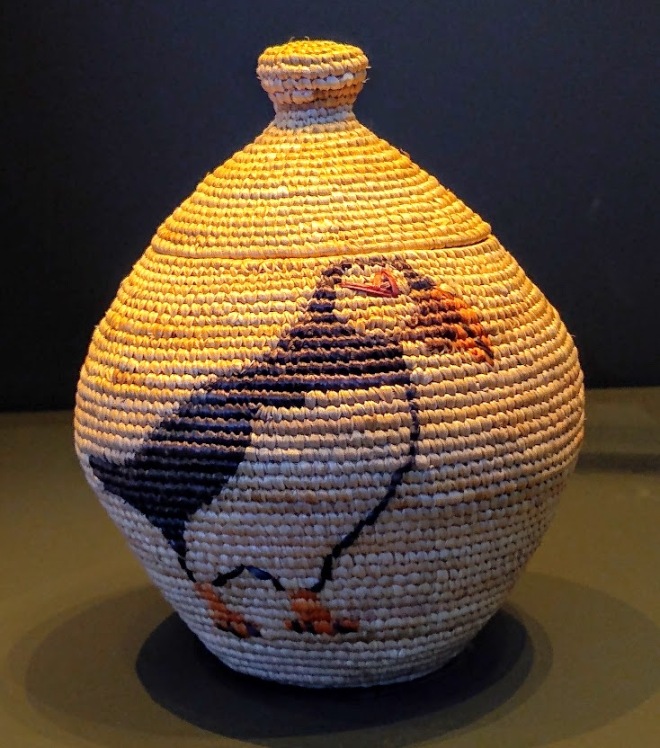 coiled basket with puffin design